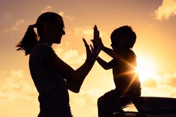 Image of happy mother and child after resolving child arrangements Salisbury